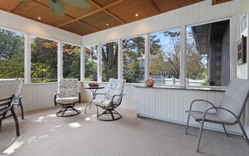 Well-fitted screened porch enclosure on residential home